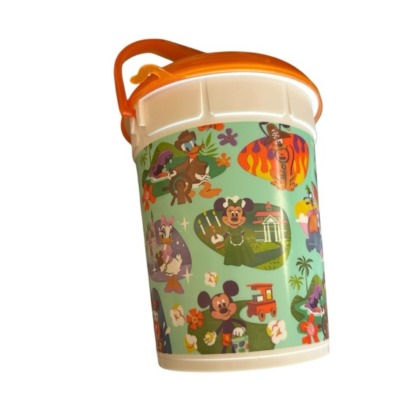 Disney Toy Bucket with Orange Lid and Green Design - Picture 1 of 3